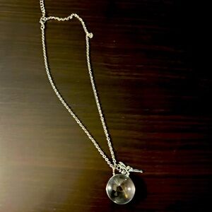 Beautiful dandelion necklace with a fairy charm